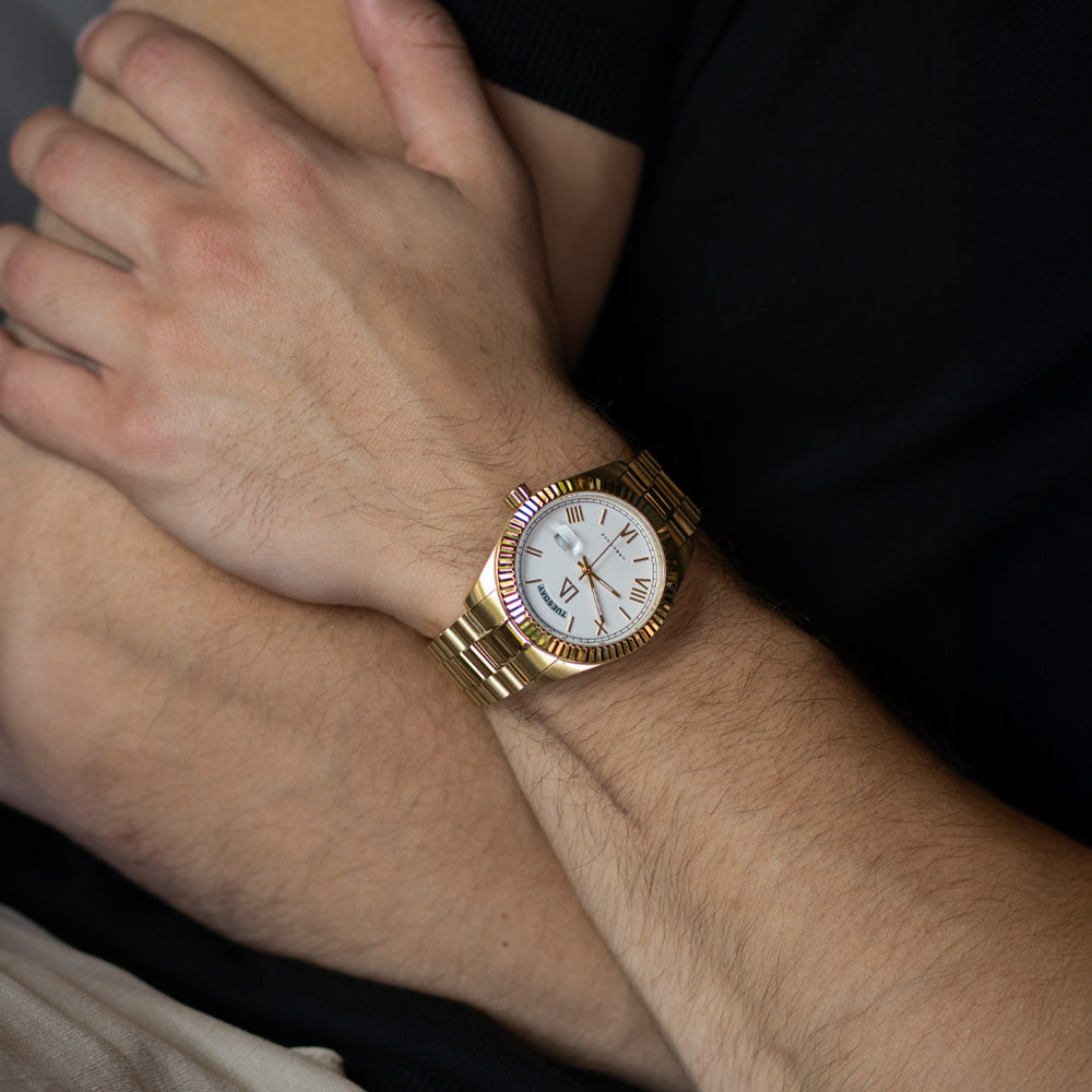 gold daydate white dial